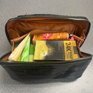 Black makeup bag with body and skin care price firm no bundling